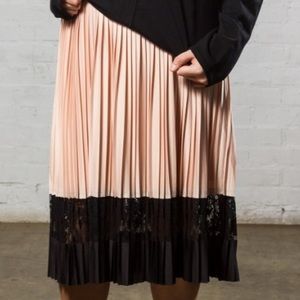 Pleated with lace tea length skirt.